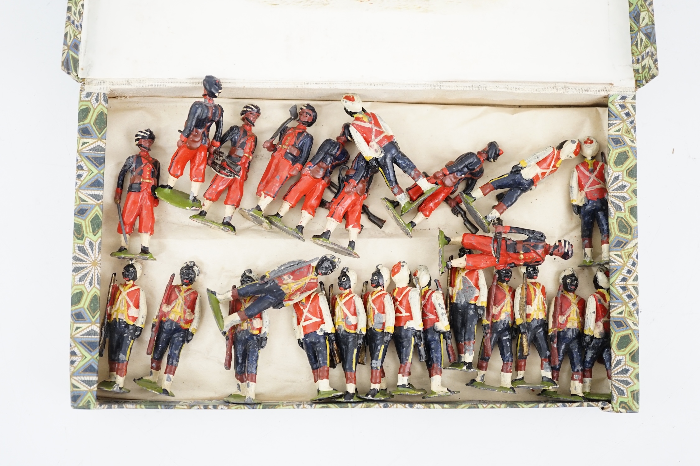 Twenty-five early twentieth century Britains lead soldiers including; eight Bombay infantry (possibly from set 68) and seventeen West Indian Regiment infantry